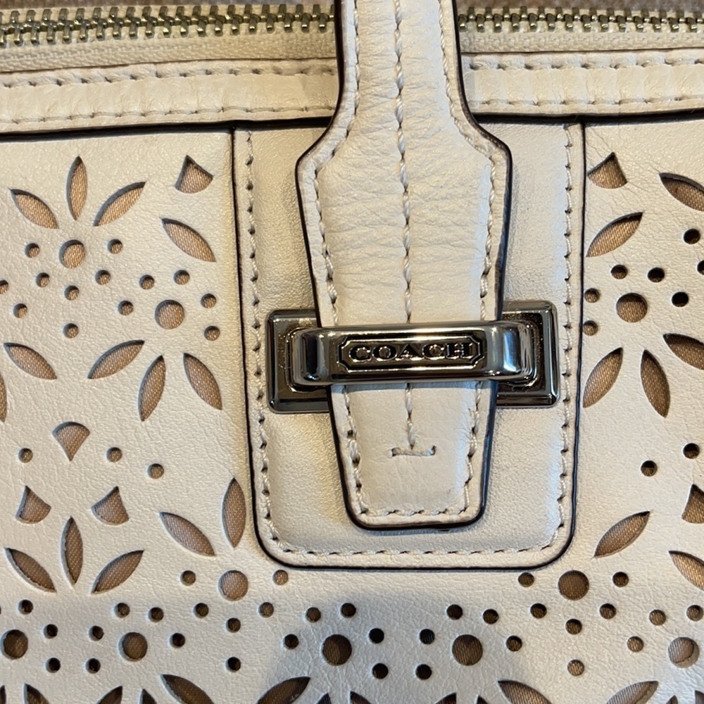 Coach Taylor Perforated Putty White Leather Satchel
12"L x 4.5"W x 8"H - Picture 5 of 11
